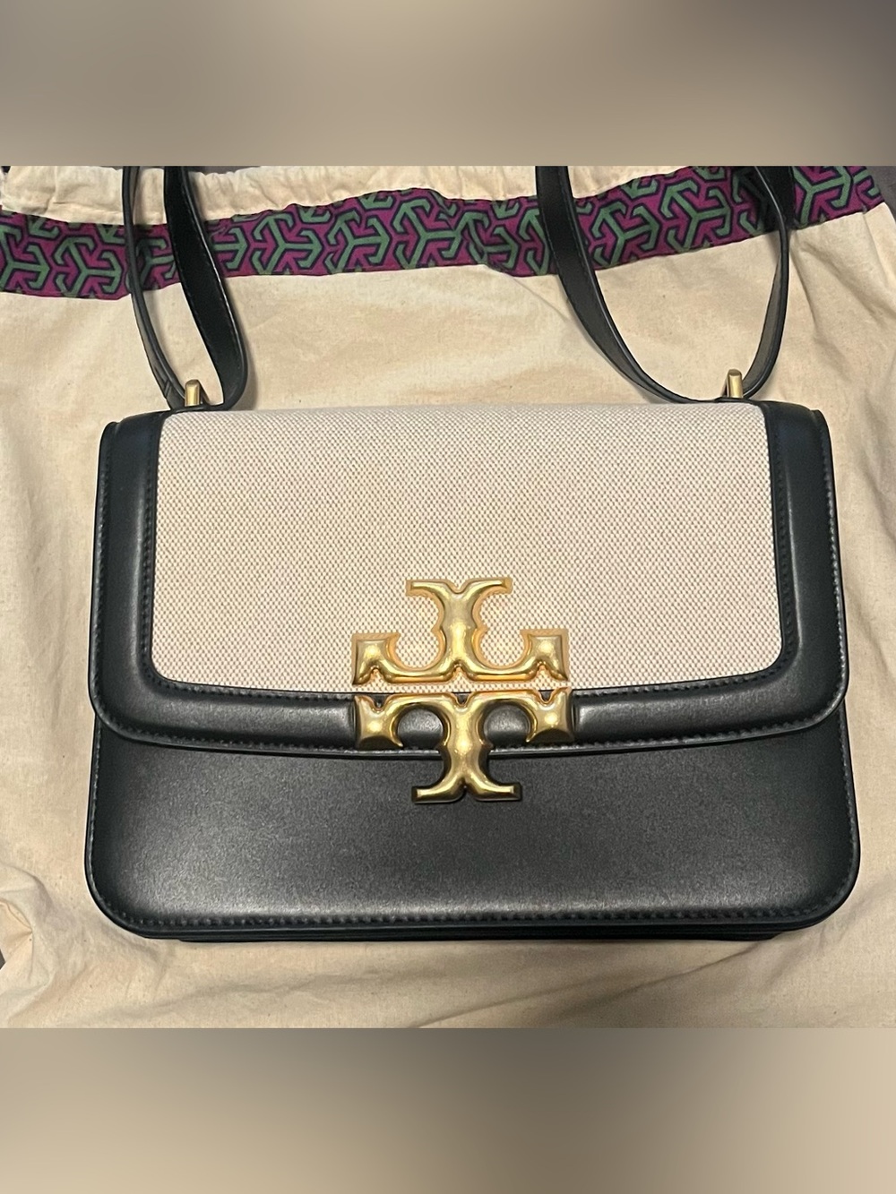 Tory Burch Elenor Two-Tone Leather and Canvas Shoulder Bag in Black and Cream.